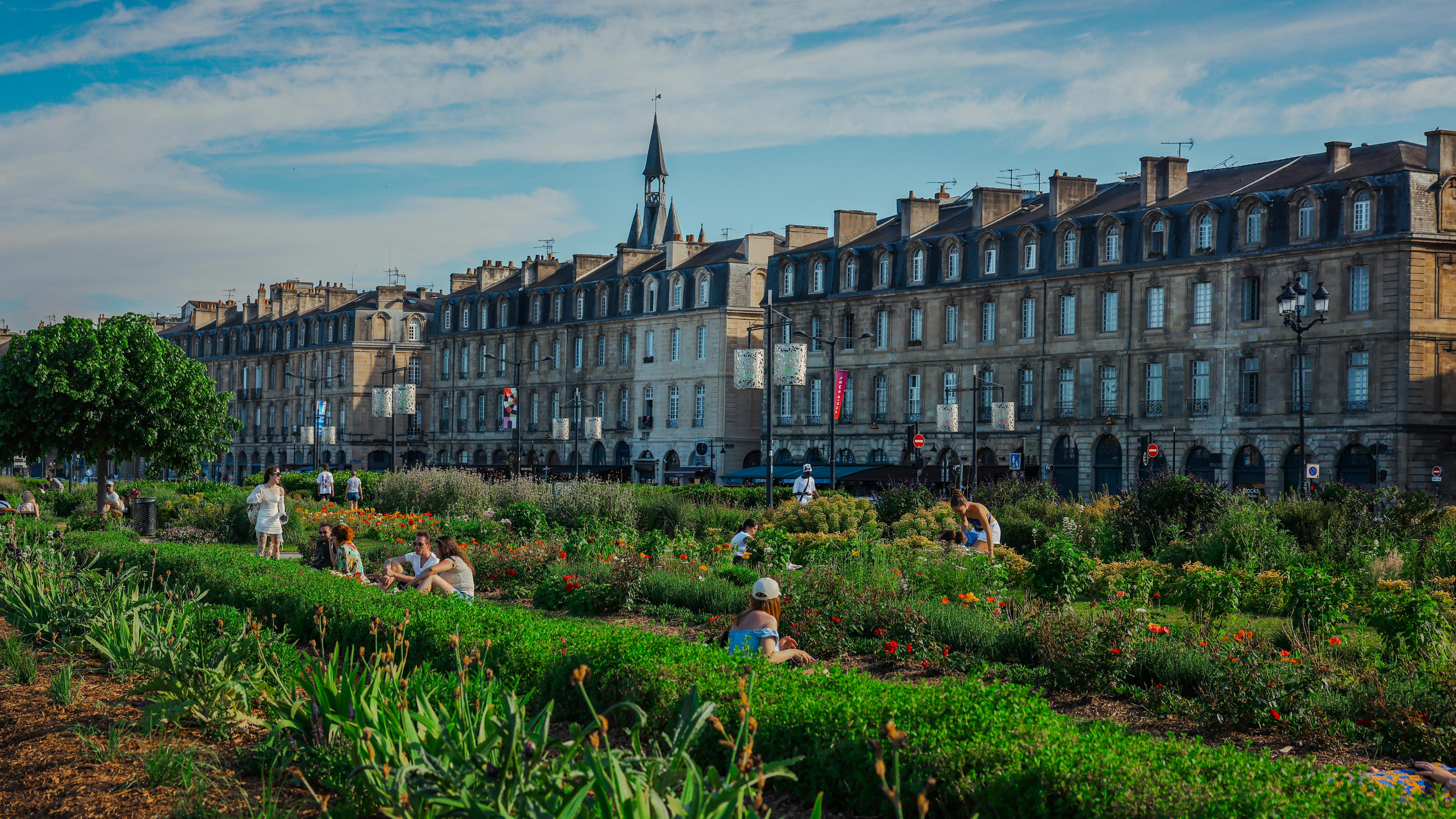 The elegant architecture and riverside gardens of Bordeaux attract retirees seeking culture and connectivity. Photo by: TBD Traveller